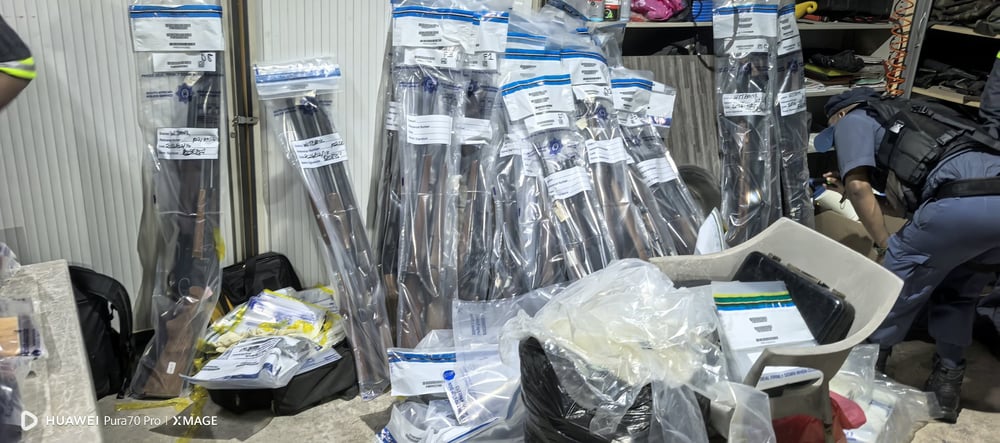Police have discovered hundreds of firearms and large quantities of ammunition stored on a smallholding outside eMalahleni (Witbank). Photo by: Yusuf Abramjee Police have discovered hundreds of firearms and large quantities of ammunition stored on a smallholding outside eMalahleni (Witbank). Photo by: Yusuf Abramjee