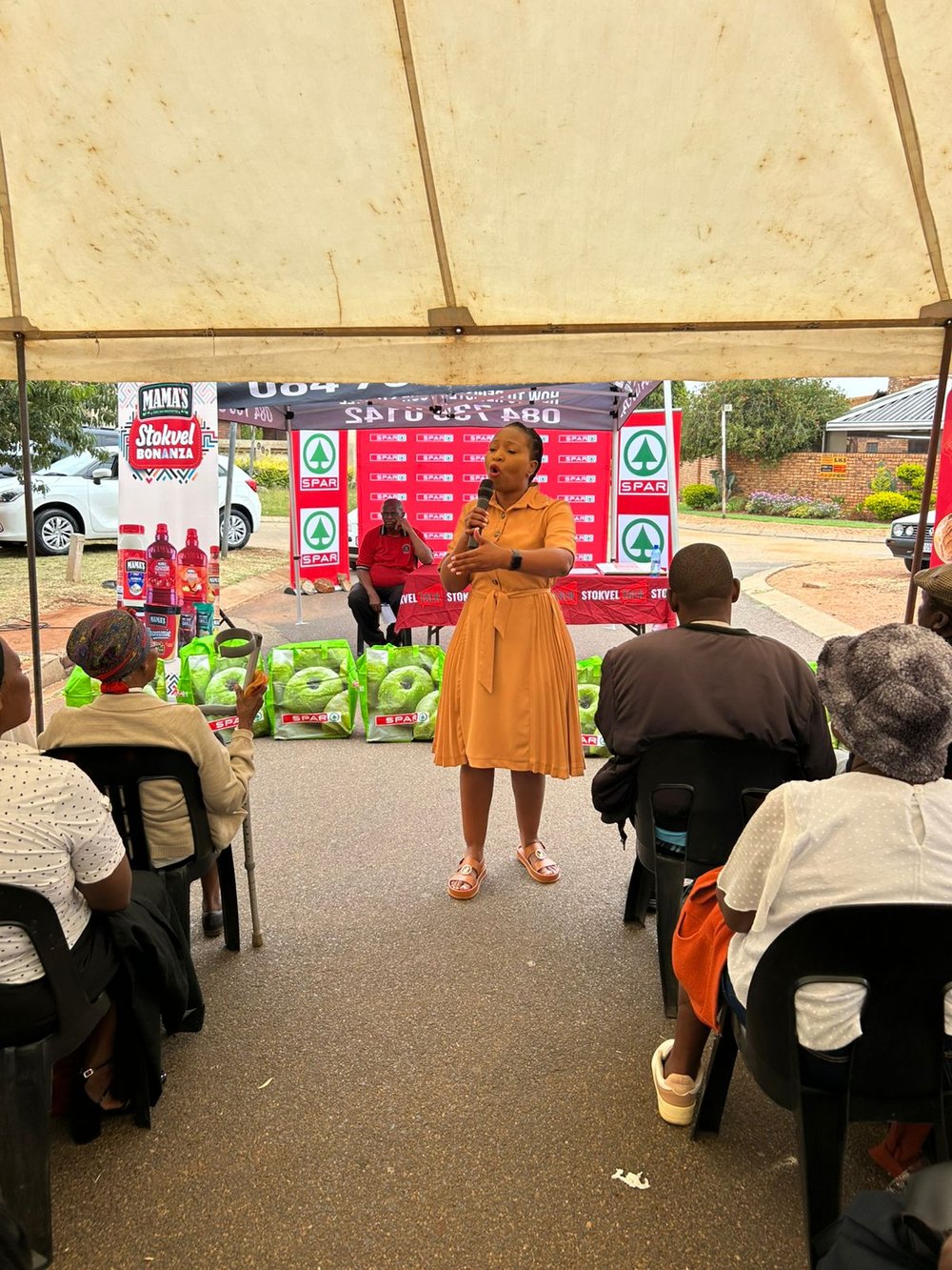 Community members gather at a Stokvel Talk event in Vosloorus, highlighting the role of savings groups in helping households manage rising living costs.