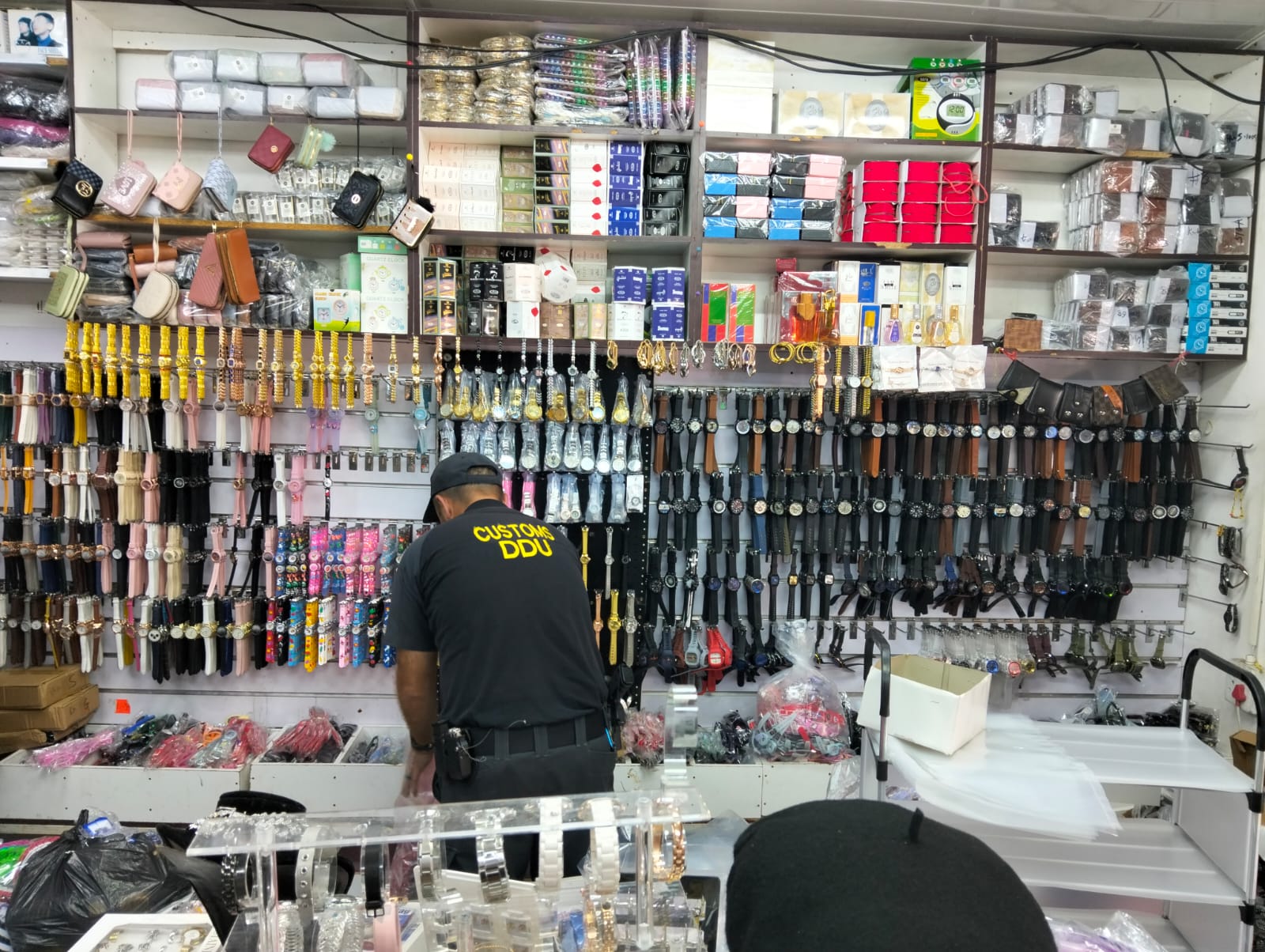SAPS Police display some of the counterfeit goods confiscated during a multi-agency operation in Musina and Thohoyandou.